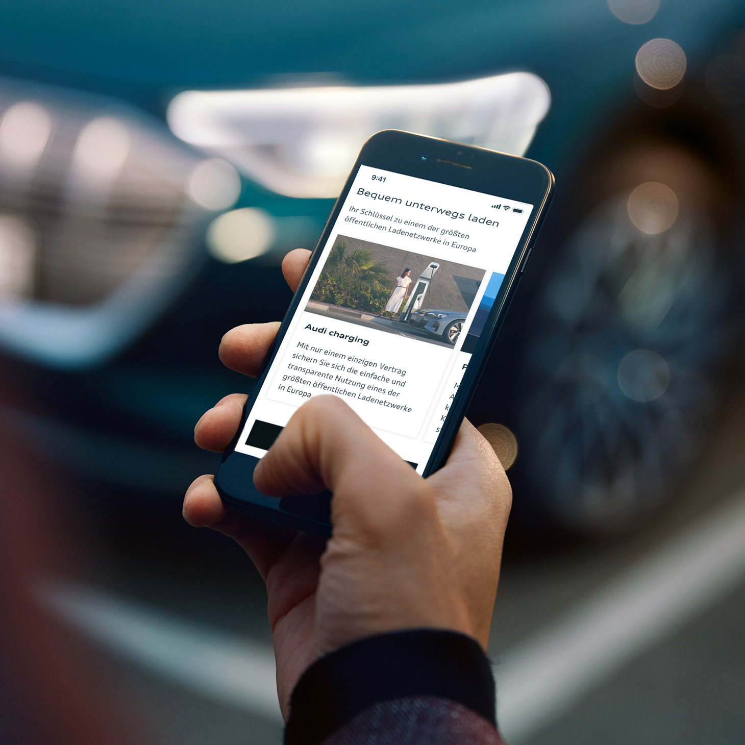 Smartphone zeigt Audi charging in myAudi App