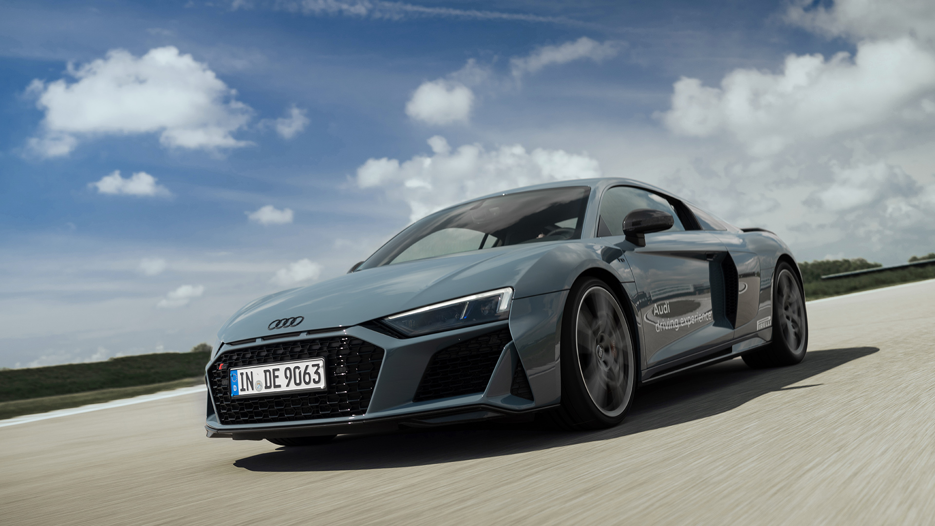 Grey Audi R8 Coupé V10 performance quattro on racing track